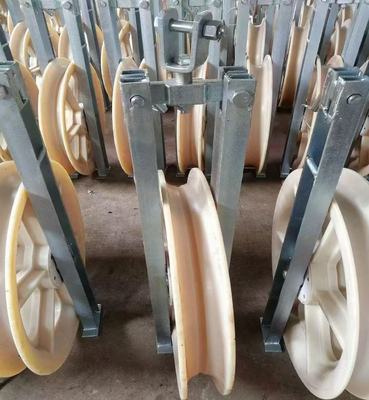 kupować Durable 1040mm Wheel Nylon Stringing Pulley Block with Galvanized Surface for Power Line Construction online manufacture